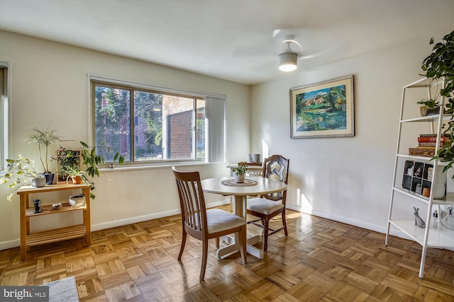 3900 Tunlaw Rd NW Unit 118, Washington, DC 20007 - dining room with baseboards and a ceiling fan