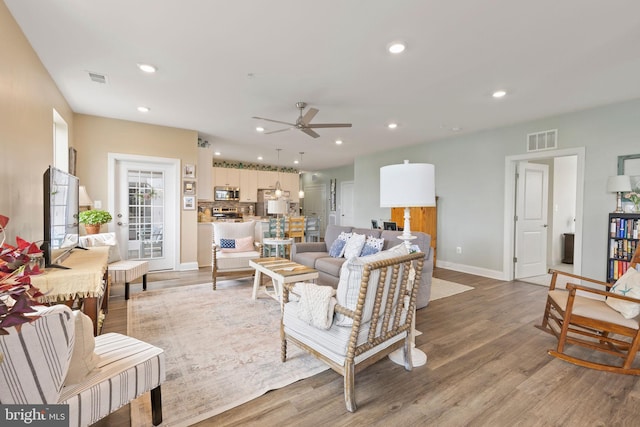 401 Bold Ruler Ct Unit 302, Havre De Grace, MD 21078 - living area featuring a ceiling fan, light wood-style flooring, recessed lighting, and baseboards