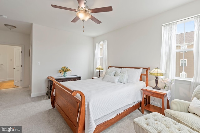 401 Bold Ruler Ct Unit 302, Havre De Grace, MD 21078 - bedroom with multiple windows, light carpet, a ceiling fan, and baseboards