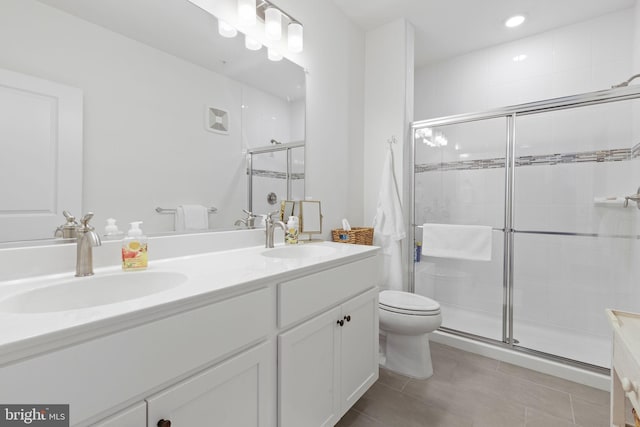 401 Bold Ruler Ct Unit 302, Havre De Grace, MD 21078 - full bathroom featuring double vanity, toilet, a shower stall, and tile patterned flooring