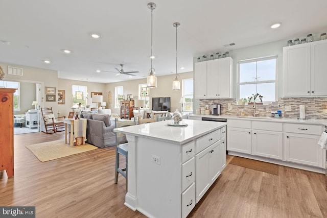 401 Bold Ruler Ct Unit 302, Havre De Grace, MD 21078 - kitchen with a sink, a ceiling fan, light wood finished floors, a kitchen island, and recessed lighting