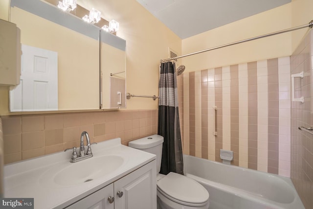 2475 Virginia Ave NW Unit 930, Washington, DC 20037 - bathroom with shower / bathtub combination with curtain, vanity, and tile walls