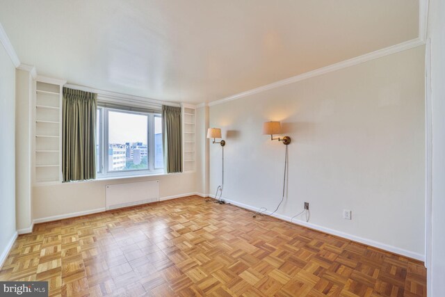 2475 Virginia Ave NW Unit 930, Washington, DC 20037 - empty room with radiator and crown molding