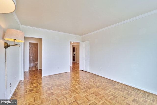 2475 Virginia Ave NW Unit 930, Washington, DC 20037 - unfurnished room featuring baseboards and crown molding
