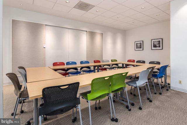 2475 Virginia Ave NW Unit 930, Washington, DC 20037 - carpeted dining space with a paneled ceiling and baseboards
