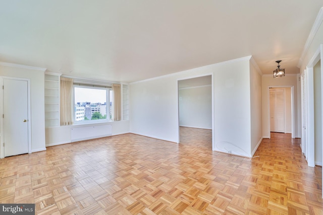 2475 Virginia Ave NW Unit 930, Washington, DC 20037 - spare room featuring ornamental molding, a chandelier, and radiator heating unit