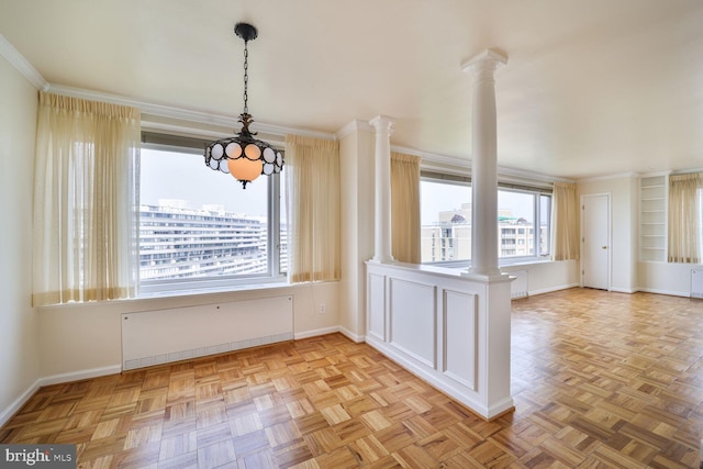 2475 Virginia Ave NW Unit 930, Washington, DC 20037 - unfurnished dining area with radiator, ornate columns, and ornamental molding