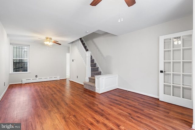 1238 Durfor St, Philadelphia, PA 19148 - unfurnished living room with ceiling fan, a baseboard radiator, wood finished floors, and stairs