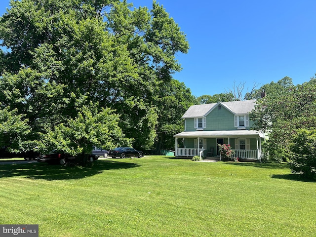 10530 Scaggsville Rd, Laurel, MD 20723 - view of green lawn with a porch