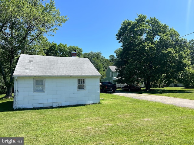 10530 Scaggsville Rd, Laurel, MD 20723 - view of home's exterior featuring a chimney and a lawn
