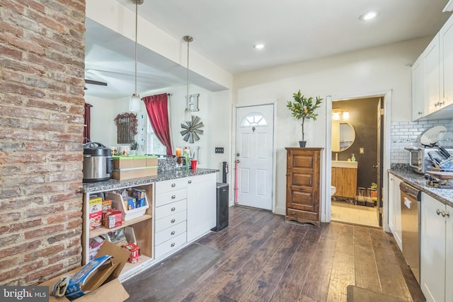 3006 Glenmore Ave, Baltimore, MD 21214 - kitchen featuring dark wood finished floors, white cabinetry, dishwasher, decorative backsplash, and stone counters