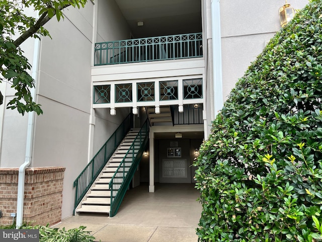 12009 Taliesin Pl Unit 36, Reston, VA 20190 - entrance to property featuring stucco siding and a balcony