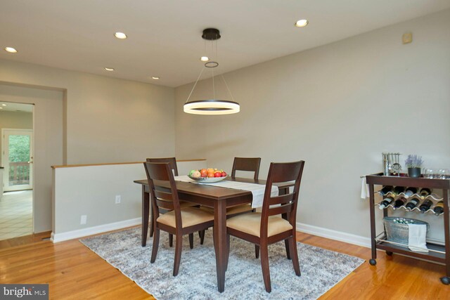 3820 Lorcom Ln, Arlington, VA 22207 - dining space featuring wood finished floors, recessed lighting, and baseboards