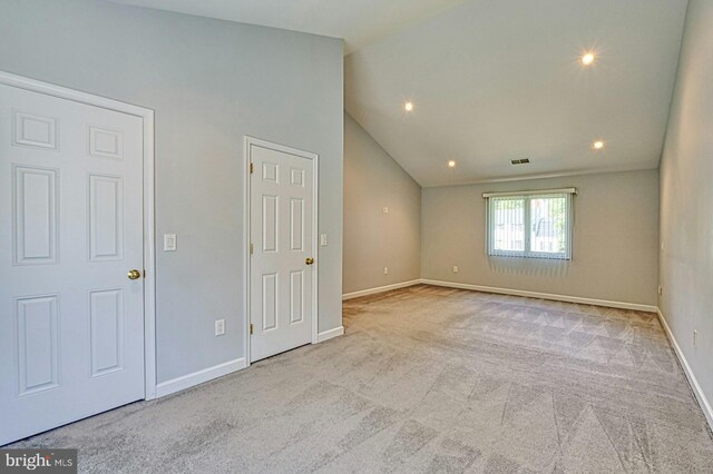 3820 Lorcom Ln, Arlington, VA 22207 - empty room with lofted ceiling, carpet, baseboards, and recessed lighting