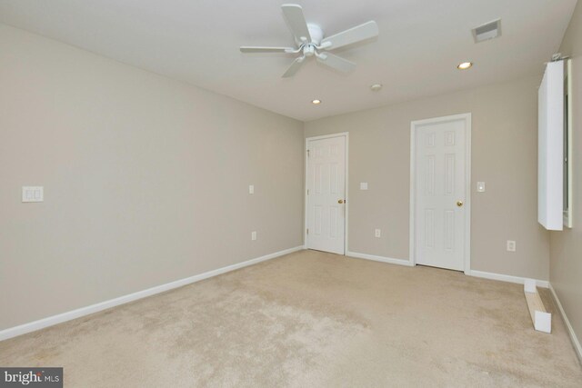 3820 Lorcom Ln, Arlington, VA 22207 - unfurnished bedroom with light colored carpet, baseboards, recessed lighting, and ceiling fan