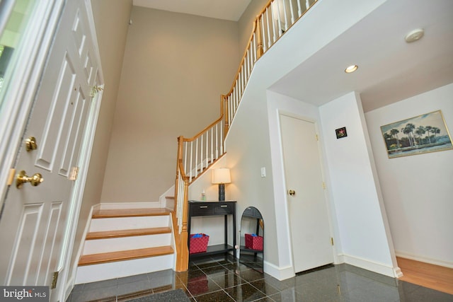 3820 Lorcom Ln, Arlington, VA 22207 - stairs featuring baseboards, granite floors, recessed lighting, and a towering ceiling