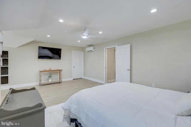 33610 Union Cir, Lewes, DE 19958 - bedroom featuring light wood finished floors, recessed lighting, a ceiling fan, and an AC wall unit