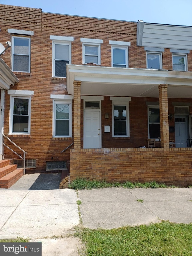 513 N Highland Ave, Baltimore, MD 21205 - multi unit property with brick siding and entry steps