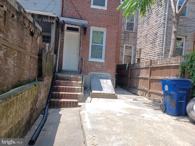 513 N Highland Ave, Baltimore, MD 21205 - view of exterior entry with brick siding