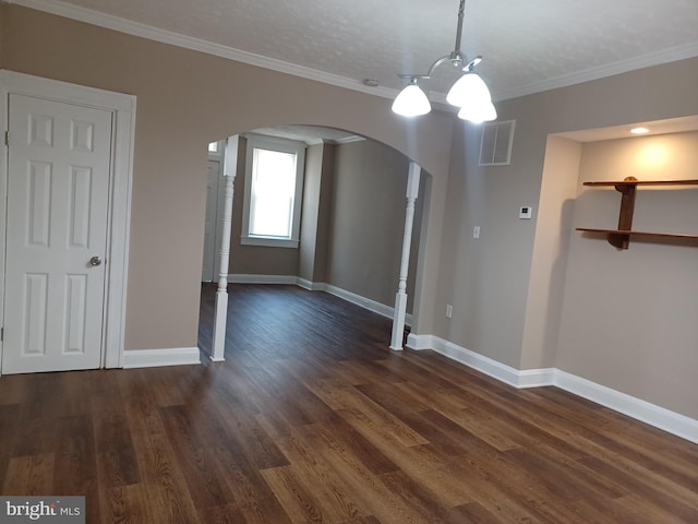 513 N Highland Ave, Baltimore, MD 21205 - spare room featuring arched walkways, baseboards, dark wood finished floors, and ornamental molding