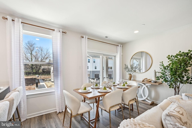 1807 Arch St Unit 21E, Norristown, PA 19401 - dining area with healthy amount of natural light, wood finished floors, baseboards, and recessed lighting