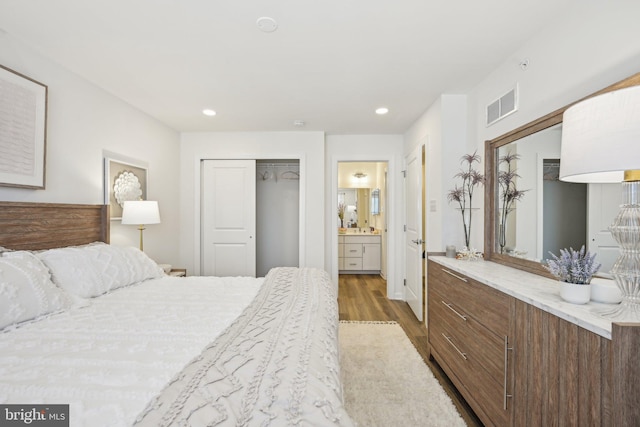 1807 Arch St Unit 21E, Norristown, PA 19401 - bedroom with wood finished floors, recessed lighting, a closet, and ensuite bathroom