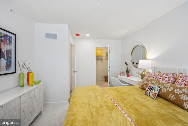 1807 Arch St Unit 21E, Norristown, PA 19401 - bedroom featuring light carpet, baseboards, a walk in closet, and recessed lighting