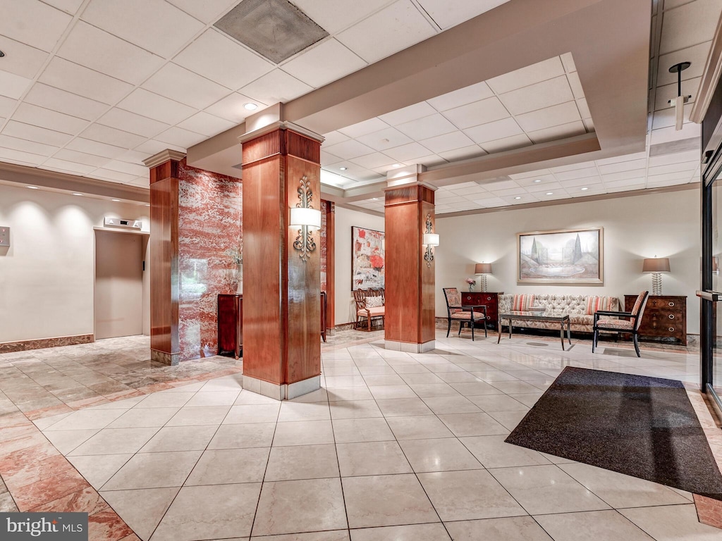 1 Slade Unit 801, Pikesville, MD 21208 - building lobby featuring a drop ceiling and crown molding