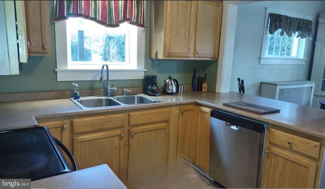 1620 Florence St, Williamsport, PA 17701 - kitchen featuring dishwasher, a sink, healthy amount of natural light, and range