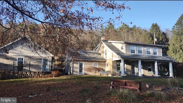 1620 Florence St, Williamsport, PA 17701 - view of front of home featuring a chimney and a porch