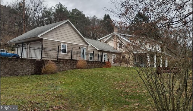1620 Florence St, Williamsport, PA 17701 - view of home's exterior with a lawn and roof with shingles