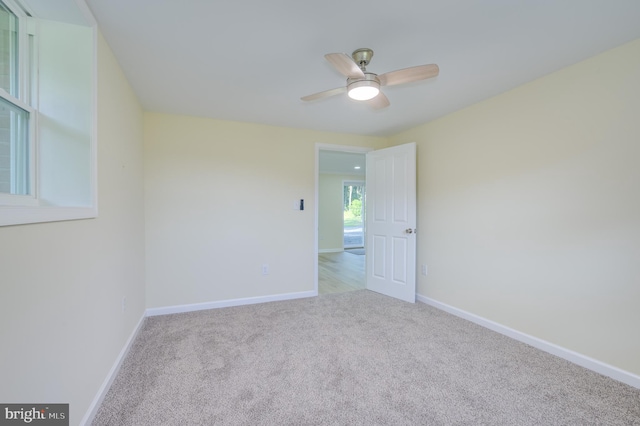 9708 Martinsburg Rd, Hedgesville, WV 25427 - spare room with ceiling fan, carpet floors, and baseboards