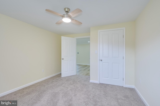 9708 Martinsburg Rd, Hedgesville, WV 25427 - unfurnished bedroom featuring carpet flooring, baseboards, and a ceiling fan