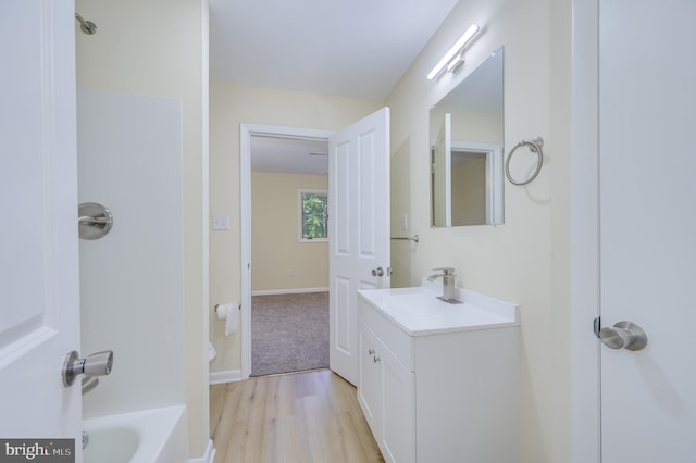 9708 Martinsburg Rd, Hedgesville, WV 25427 - bathroom with vanity, wood finished floors, and baseboards