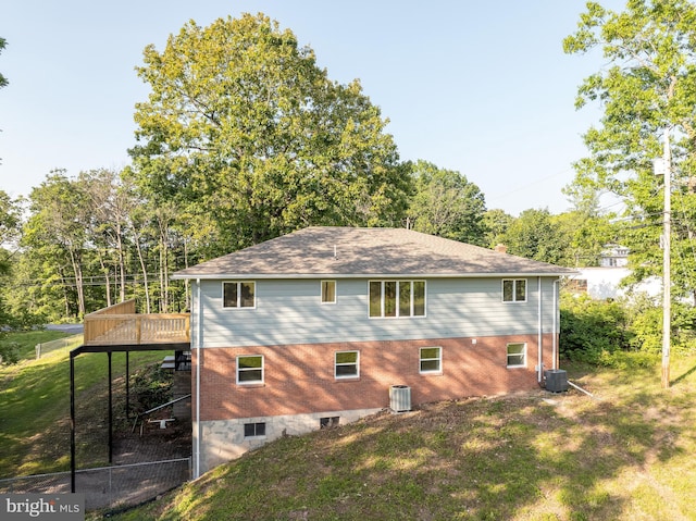 9708 Martinsburg Rd, Hedgesville, WV 25427 - back of property featuring brick siding, a wooden deck, and cooling unit