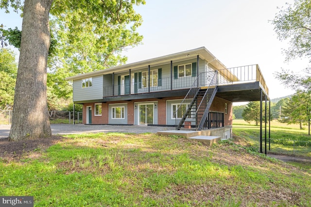 9708 Martinsburg Rd, Hedgesville, WV 25427 - back of property featuring stairs, a lawn, and a deck