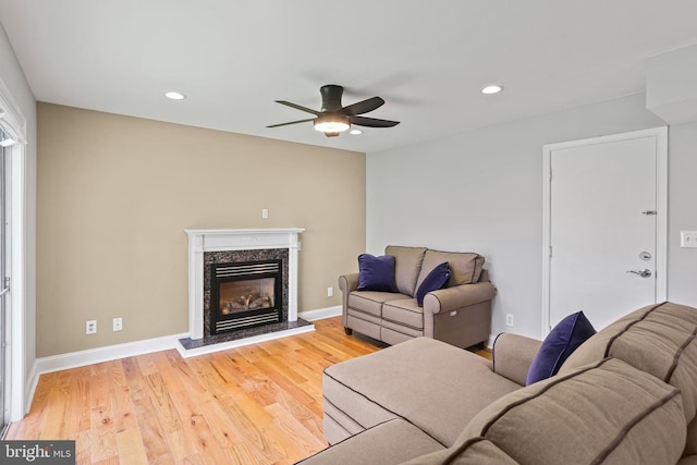 9416 Seven Courts Dr, Baltimore, MD 21236 - living room with ceiling fan, a premium fireplace, recessed lighting, wood finished floors, and baseboards
