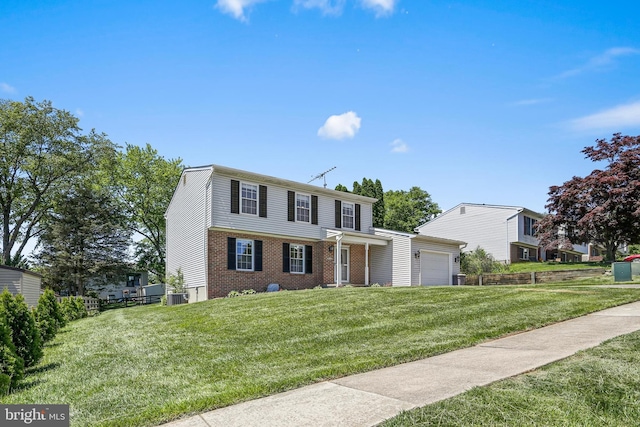 9416 Seven Courts Dr, Baltimore, MD 21236 - view of front of house with an attached garage, central AC unit, and brick siding