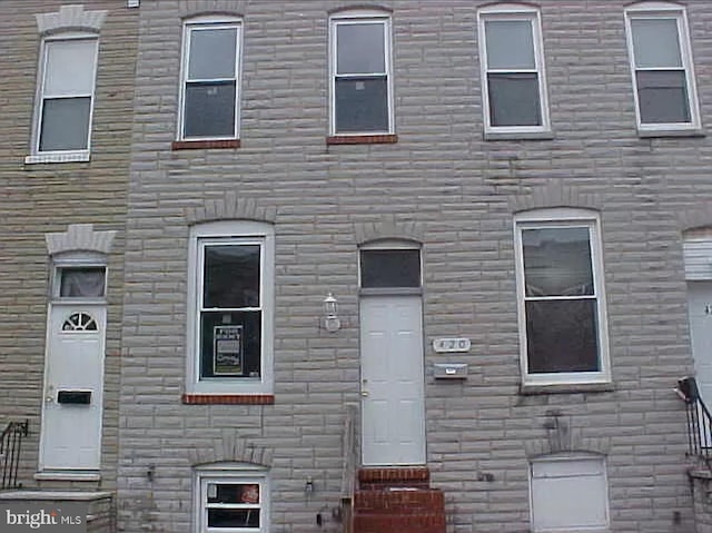 420 N Glover St, Baltimore, MD 21224 - view of front of property with entry steps and stone siding