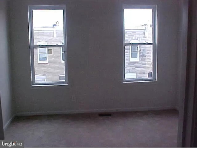 420 N Glover St, Baltimore, MD 21224 - unfurnished room featuring carpet floors