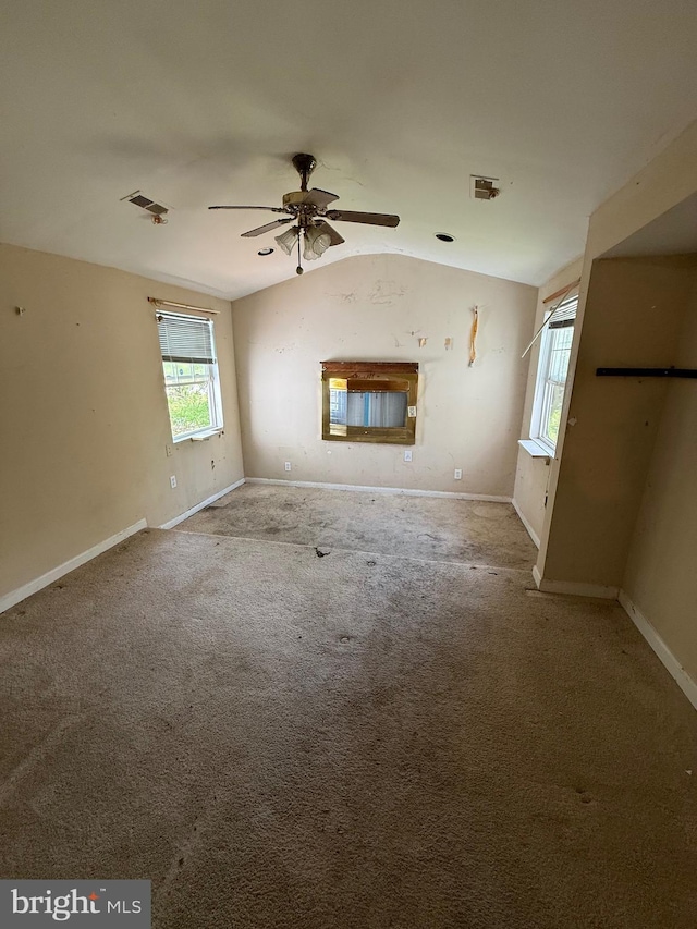 42264 Ridge Rd, Mechanicsville, MD 20659 - unfurnished living room with lofted ceiling, healthy amount of natural light, a ceiling fan, and baseboards