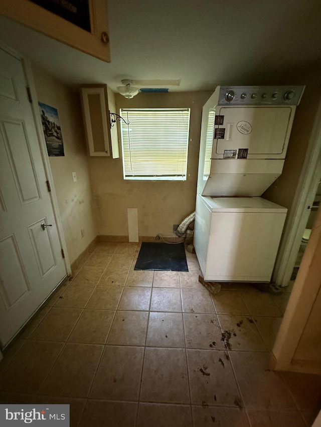 42264 Ridge Rd, Mechanicsville, MD 20659 - washroom featuring estacked washer and dryer and tile patterned flooring