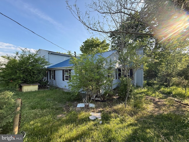 42264 Ridge Rd, Mechanicsville, MD 20659 - view of property exterior with metal roof