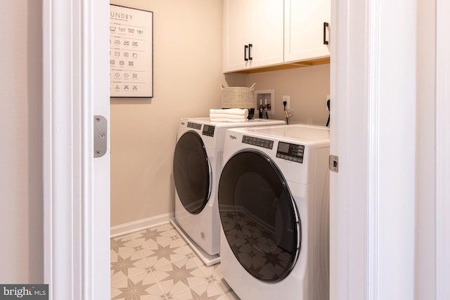 10009B American Pharoah Ln, Laurel, MD 20723 - laundry area featuring cabinet space, washing machine and dryer, baseboards, and light flooring