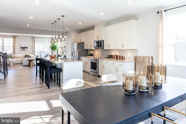 10009B American Pharoah Ln, Laurel, MD 20723 - dining area featuring light wood finished floors and recessed lighting
