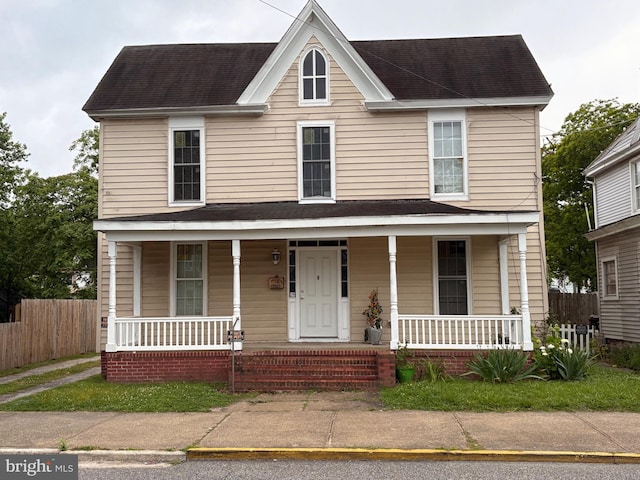 810 Locust St, Cambridge, MD 21613 - view of front of property with a porch and roof with shingles