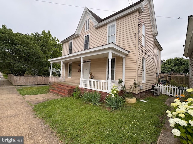 810 Locust St, Cambridge, MD 21613 - view of front facade with covered porch and cooling unit