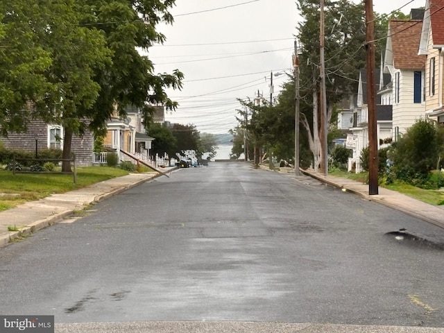 810 Locust St, Cambridge, MD 21613 - view of asphalt road featuring sidewalks and curbs