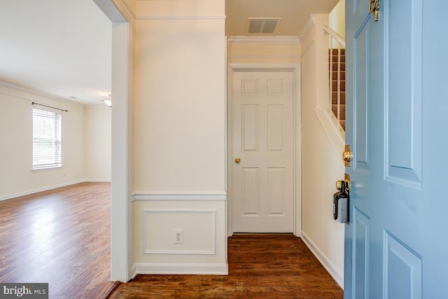 8064 Stonewall Brigade Ct, Manassas, VA 20109 - entrance foyer with dark wood-style flooring, ornamental molding, and baseboards