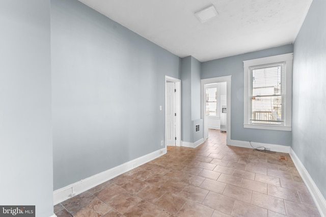 2808 Presstman St, Baltimore, MD 21216 - spare room with baseboards